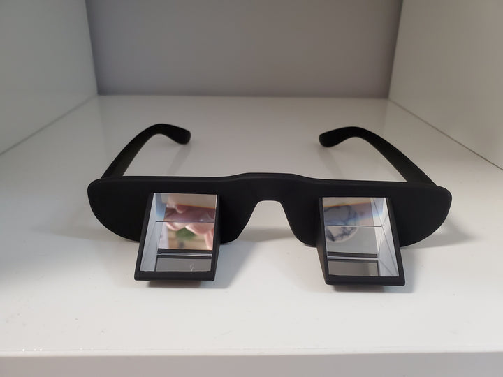 FACE DOWN POSITIONING GLASSES